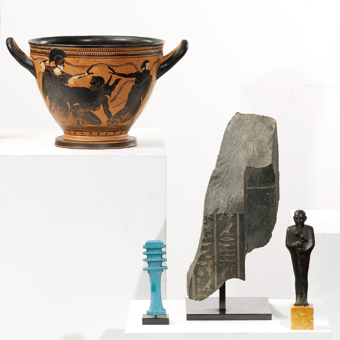 Pictured: A collection of antiquities, including an Egyptian granodiorite fragment and a black-figure skyphos Image