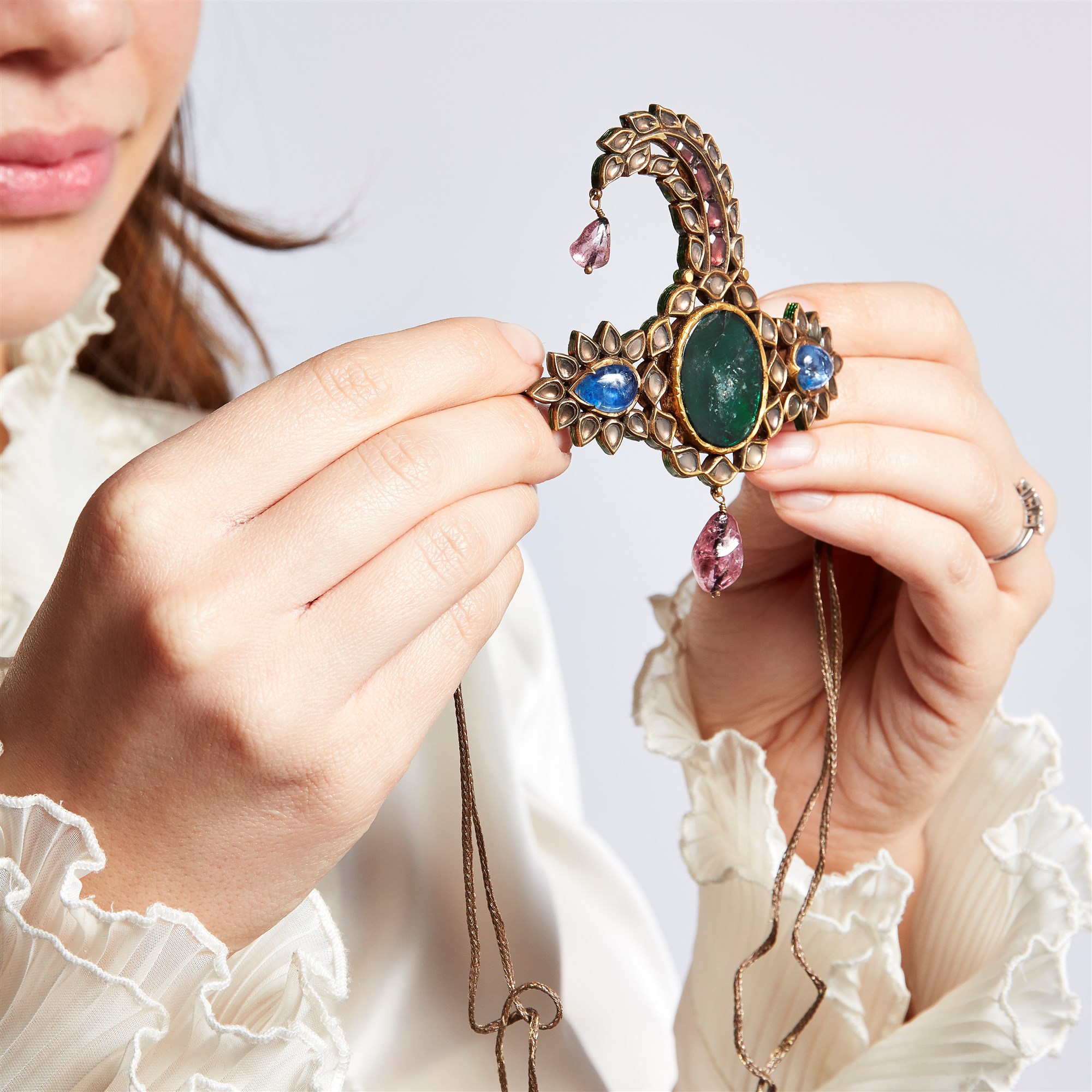 A sapphire-, emerald- and spinel-set gold sarpech, Murshidabad, India, mid-18th century