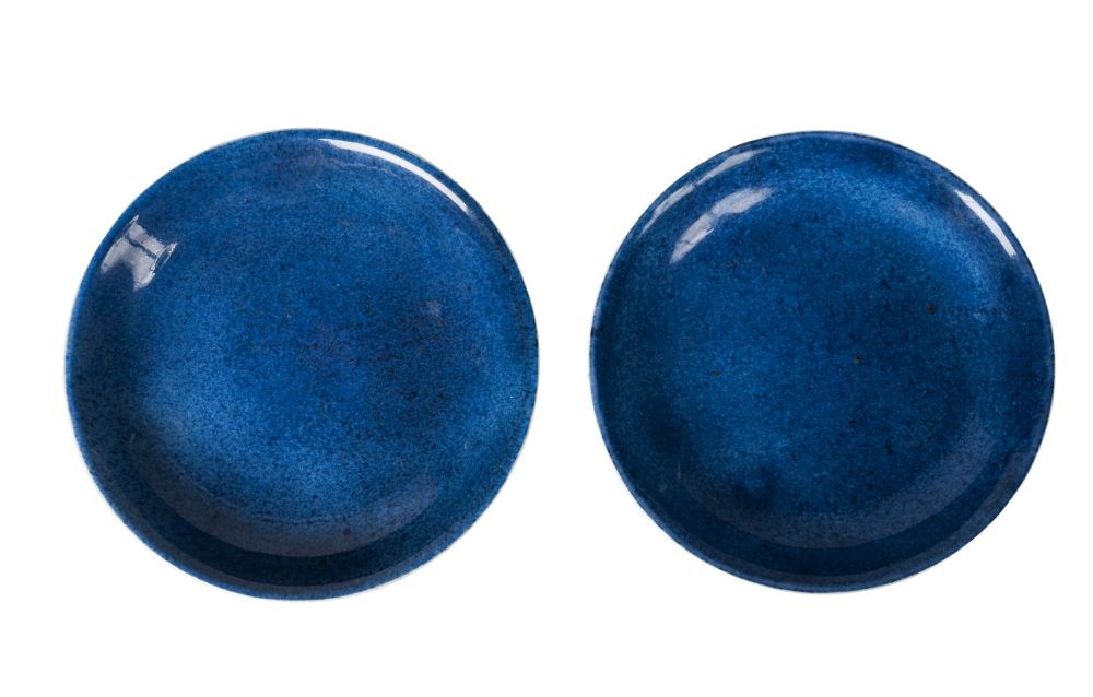 A pair of Chinese porcelain monochrome powder blue dishes