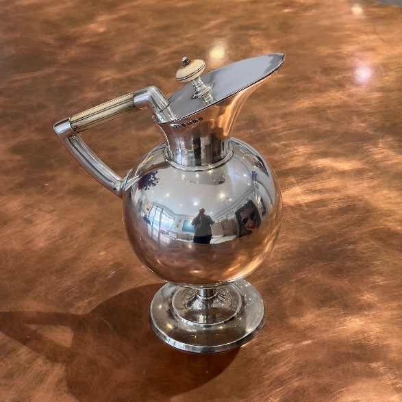  Dr Christopher Dresser (British 1834-1904), an electroplated articulated letter/toast rack made by Hukin & Heath Mark of Hukin & Heath