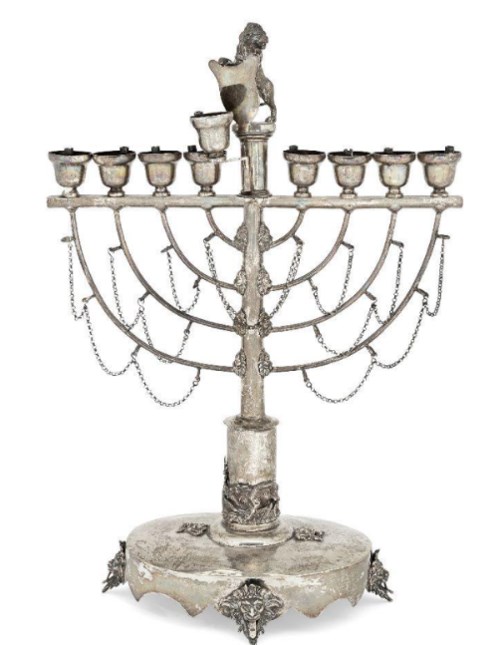 A large Austro-Hungarian menorah, mid-19th century, stamped only with 13 standard mark