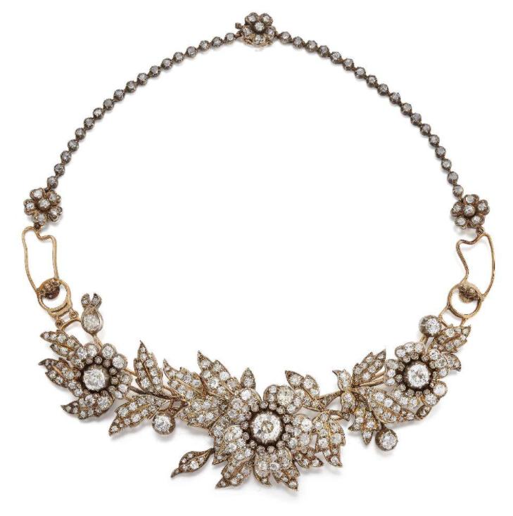  A late 19th century diamond necklace Coming with an estimate of £5000-7000 is this beautiful Victorian diamond necklace. This is a great example of the type of high-end jewellery produced during the 1890s. Composed of three old-brilliant-cut diamond floral sprays, each with central flowerhead cluster mounted en tremblent. a method of constructing the central diamond flower head on a delicate spring to give the effect of the cluster shimmering when moved. Each spray is detachable from the necklace for optional use for wear as separate brooches. The necklace is complete with its original fitted case and fittings.